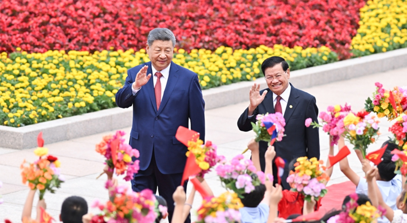 习近平同老挝人民革命党中央总书记、国家主席通伦举行会谈